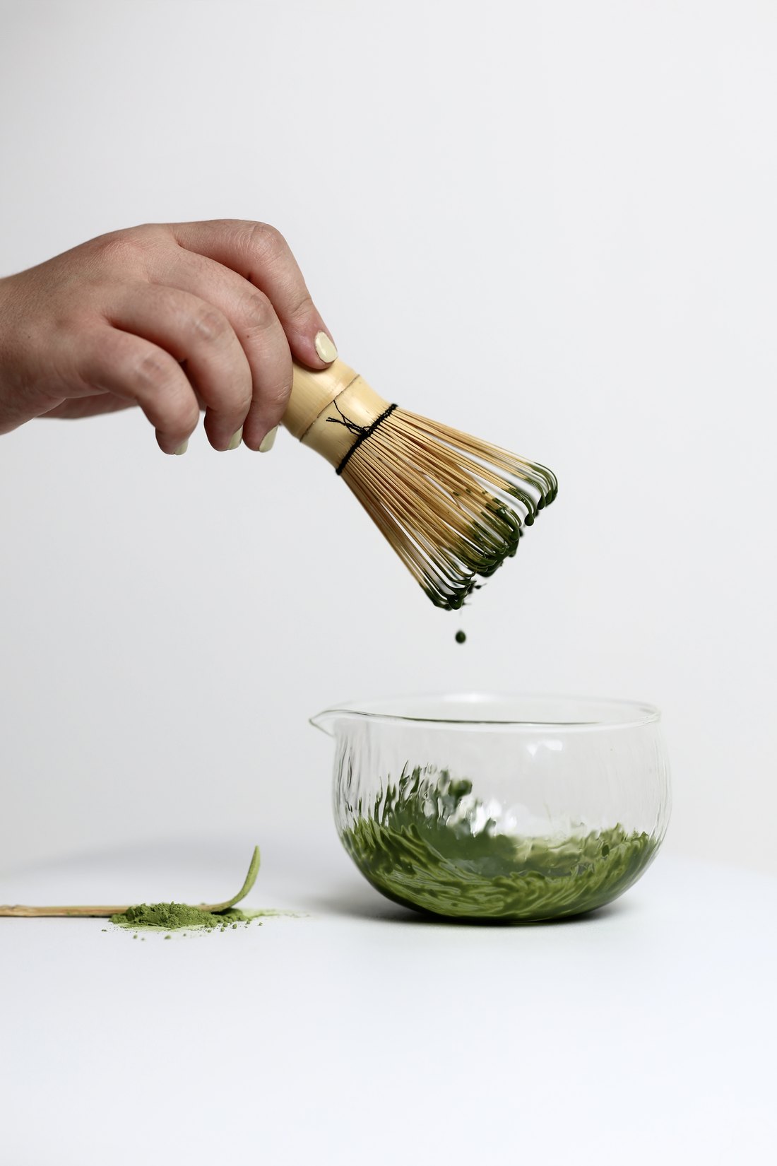 Whisking a bowl of Miraka matcha